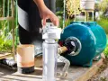 Wymiana filtra wody w systemie hydroforowym. Sprawdź, jak zwiększyć ciśnienie wody w domu.
