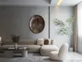Salon w stylu **japandi**: beżowa sofa, okrągły stolik, dekoracyjna taca i drzewko w donicy tworzą harmonijną przestrzeń.